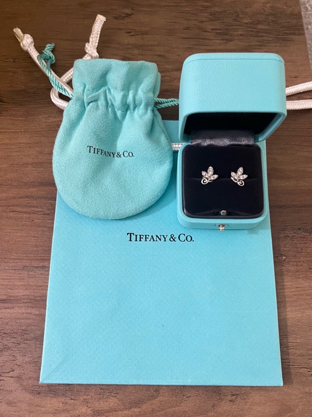 Tiffany & Co. .14 CTW Diamond and 18K White Gold Olive Leaf Earrings w Packaging - Picture 2 of 2